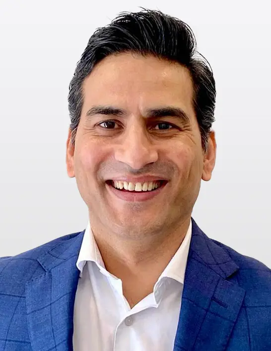 Man in a blue suit jacket.